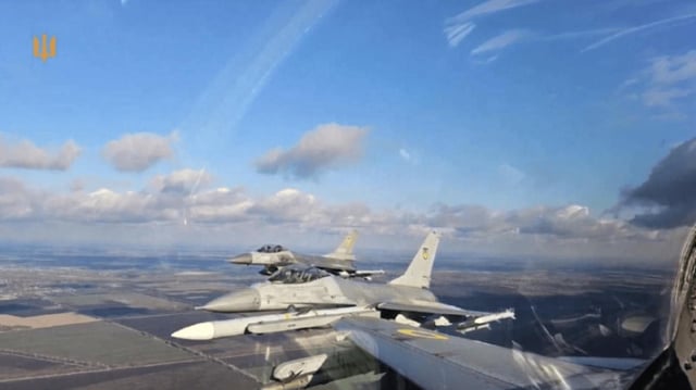 Still image from a Ukrainian air force video shows American-made F-16 combat jets in action over Ukraine.