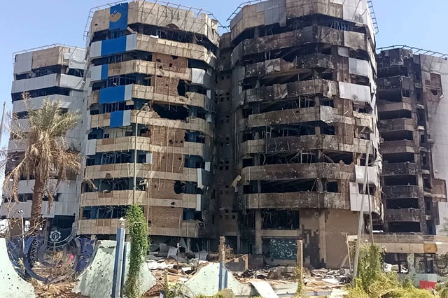 The heavily-damaged building that housed the headquarters of the Central Bank of Sudan is pictured in Khartoum's Muqrin neighbourhood on March 22, 2025.