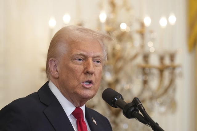 President Donald Trump speaks at a reception celebrating Women&#39;s History Month in the East Room of the White House, Wednesday, March 26, 2025, in Washington.