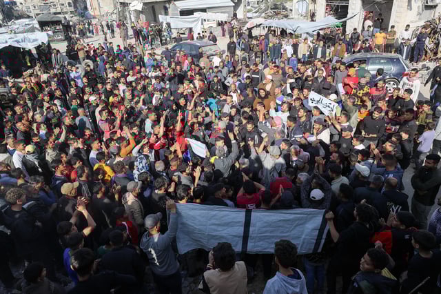 Palestinians protest to demand an end to war, chanting anti-Hamas slogans, in Beit Lahiya in the northern Gaza Strip March 26, 2025. REUTERS/Stringer/File Photo