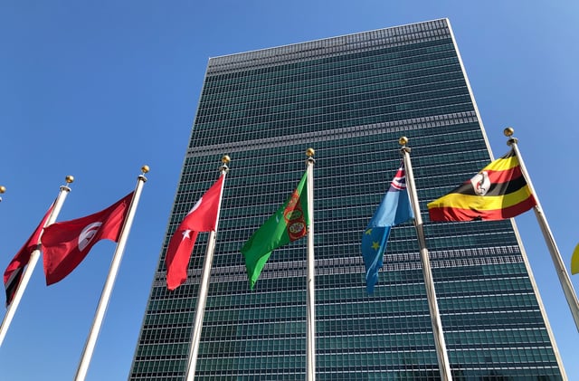 FILE - Flags fly outside the United Nations headquarters Sept. 28, 2019. (AP Photo/Jennifer Peltz, File)