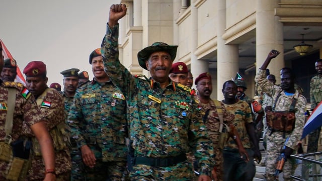 General Abdel Fattah al-Burhan arrives at the presidential palace in Khartoum