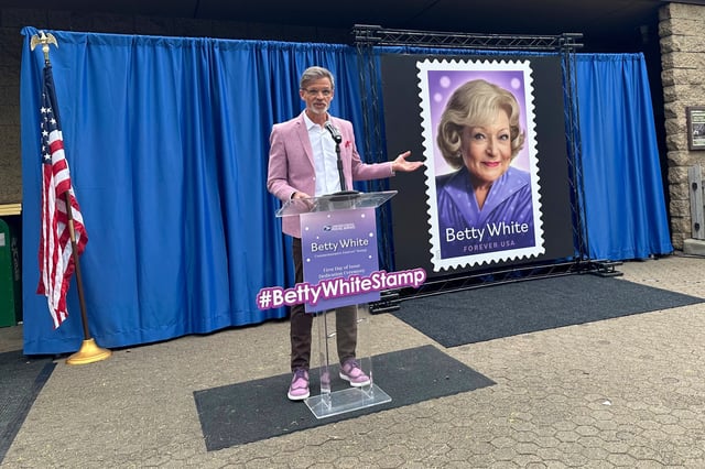 Dale Stephanos, artist who created the Betty White stamp, speaks at the first day of issue dedication ceremony Thursday, March 27, 2025, at the Los Angeles Zoo, in Los Angeles. (AP Photo/Beth Harris)