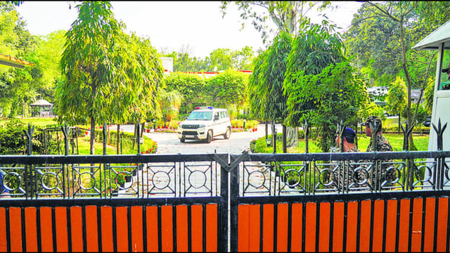 A police vehicle parked inside the residence of Delhi High Court Judge Justice Yashwant Varma, in New Delhi, Wednesday, March 26, 2025. A team led by Deputy Commissioner of Police (New Delhi) on Wednesday visited the residence of Justice Varma in connection with the investigation into the alleged discovery of cash, official sources said. (PTI)