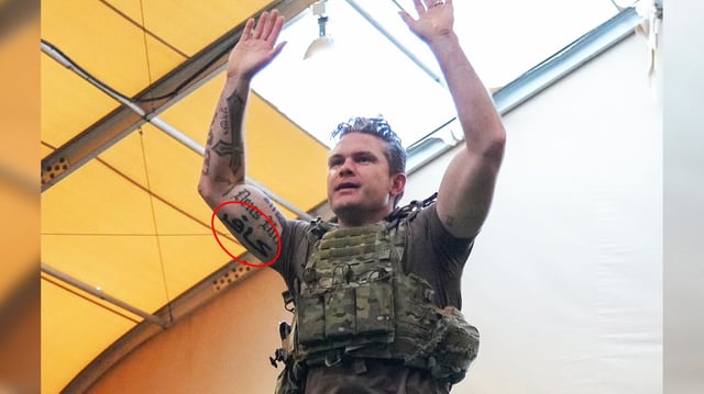 Secretary of Defense Pete Hegseth shows off a new tattoo on his right bicep that reads &#34;kafir&#34; in Arabic – a word that translates to &#34;infidel.&#34;