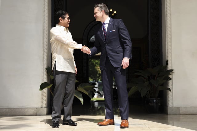 Philippine President Ferdinand Marcos Jr., left, meets with U.S. Defense Secretary Pete Hegseth at the Malacanang presidential palace in Manila, Philippines, Friday, March 28, 2025. (AP Photo/Basilio Sepe, Pool)