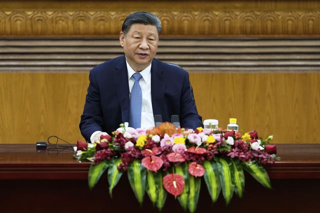 Chinese President Xi Jinping attends an event at the Great Hall of the People in Beijing on Friday, March 28, 2025. (AP Photo/Ng Han Guan)