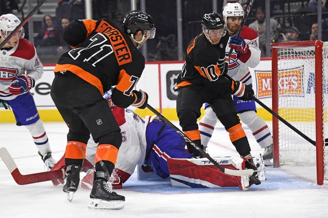Mar 27, 2025; Philadelphia, Pennsylvania, USA; Philadelphia Flyers right wing Tyson Foerster (71) scores a goal past Montreal Canadiens goaltender Jakub Dobes (75) during the third period at Wells Fargo Center. Mandatory Credit: Eric Hartline-Imagn Images