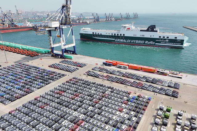 Cars wait to be loaded onto the Eco Napoli at the port in Yantai, in China's eastern Shandong province, on March 26, 2025.