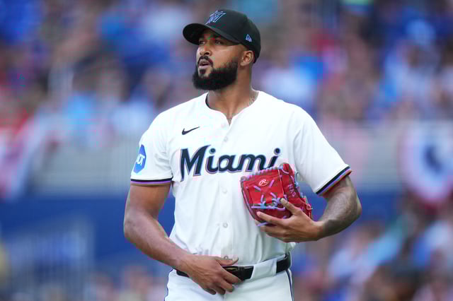 MIAMI, FLORIDA - MARCH 27: Sandy Alcantara #22 of the Miami Marlins looks on during the second inning against the Pittsburgh Pirates on Opening Day at loanDepot park on March 27, 2025 in Miami, Florida.