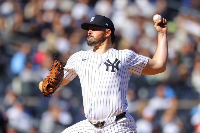 NEW YORK, NEW YORK - MARCH 27: Carlos Rodón #55 of the New York Yankees throws a pitch against the Milwaukee Brewers on Opening Day at Yankee Stadium on March 27, 2025 in New York City.