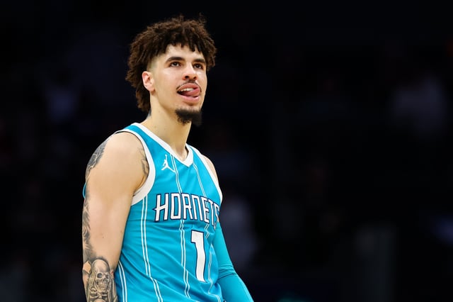 LaMelo Ball #1 of the Charlotte Hornets looks on during the second half of a basketball game against the Orlando Magic at Spectrum Center on March 25, 2025 in Charlotte, North Carolina. The Hornets&#39; superstar guard will miss the rest of the season due to ankle and wrist injuries.