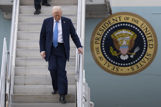 President Donald Trump arrives on Air Force One at Palm Beach International Airport, Friday, March 28, 2025, in West Palm Beach, Fla. (AP Photo/Manuel Balce Ceneta)