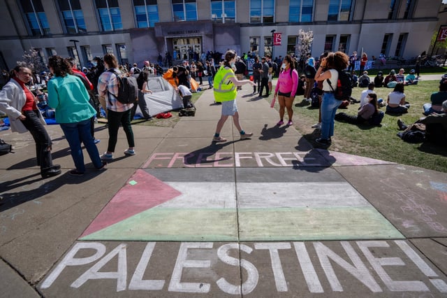 People protest the Israel-Hamas war Wednesday, May 1, 2024 at the University of Wisconsin-Madison in Madison, Wisconsin.
