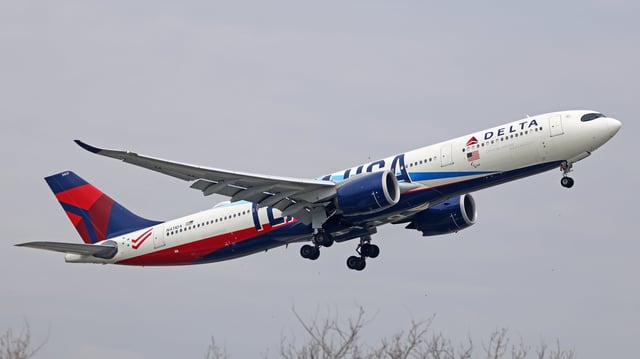 A Delta flight nearly collided with an Air Force jet.
