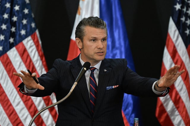 US Secretary of Defense Pete Hegseth gestures during a joint press conference with Philippines&#39; Secretary of National Defense Gilberto Teodoro after their meeting at Camp Aguinaldo in Manila on March 28, 2025.