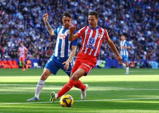 Soccer Football - LaLiga - Espanyol v Atletico Madrid - RCDE Stadium, Cornella de Llobregat, Spain - March 29, 2025 Espanyol's Jofre Carreras in action with Atletico Madrid's Cesar Azpilicueta