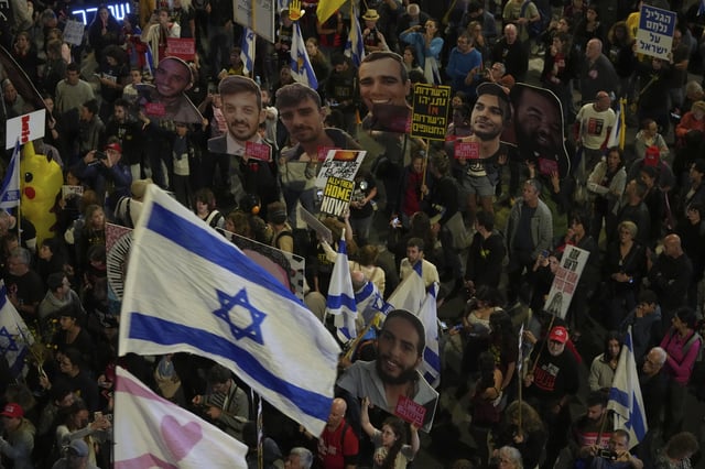 People take part in a protest demanding the immediate release of hostages held by Hamas in the Gaza Strip, in Tel Aviv, Israel, Saturday, March 29, 2025. (AP Photo/Maya Alleruzzo)