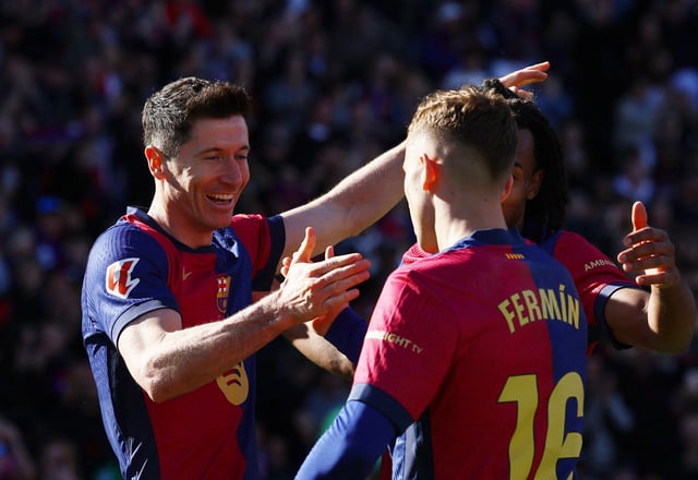 Soccer Football - LaLiga - FC Barcelona v Girona - Estadi Olimpic Lluis Companys, Barcelona, Spain - March 30, 2025 FC Barcelona's Robert Lewandowski celebrates with Fermin Lopez and Jules Kounde after scoring their second goal