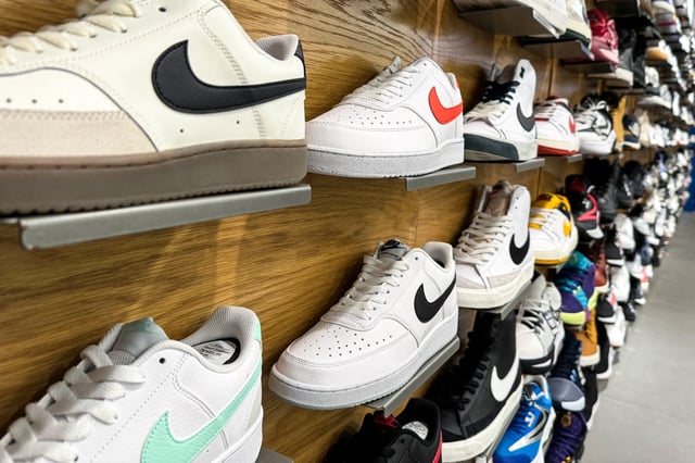 Nike shoes are displayed at a Macy's store in San Francisco on March 21, 2024.