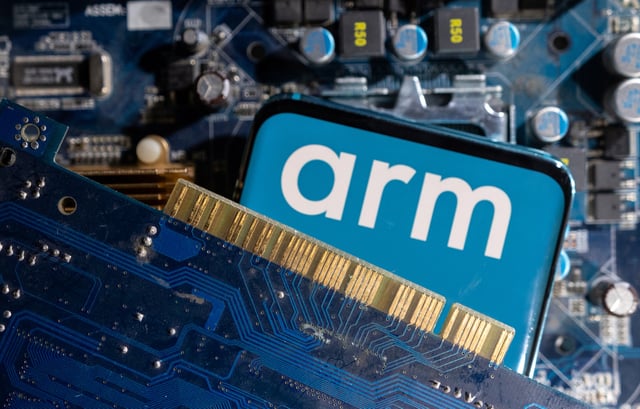 A smartphone with a displayed Arm Ltd logo is placed on a computer motherboard in this illustration taken March 6, 2023. REUTERS/Dado Ruvic/Illustration/ File Photo