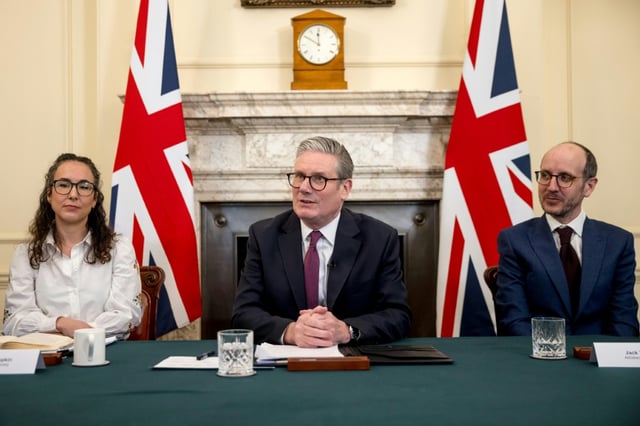 UK Prime Minister Keir Starmer, centre, with Sarah Simpkin from the Children's Society and writer Jack Thorne of the Netflix drama 'Adolescence'