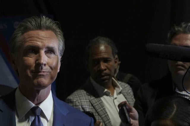 Sep 10, 2024; Philadelphia, PA, USA; California Gov. Gavin Newsom speaks to media in the spin room before the ABC News Presidential Debate. Mandatory Credit: Megan Smith-USA TODAY Network via Imagn Images