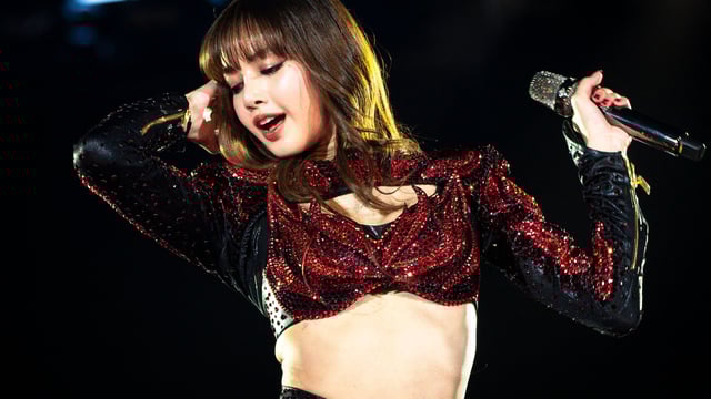 Thai rapper and singer Lisa, from South Korean group Blackpink, performs during the New Year's Eve celebrations in Bangkok on December 31, 2024. (Photo by Chanakarn Laosarakham / AFP)