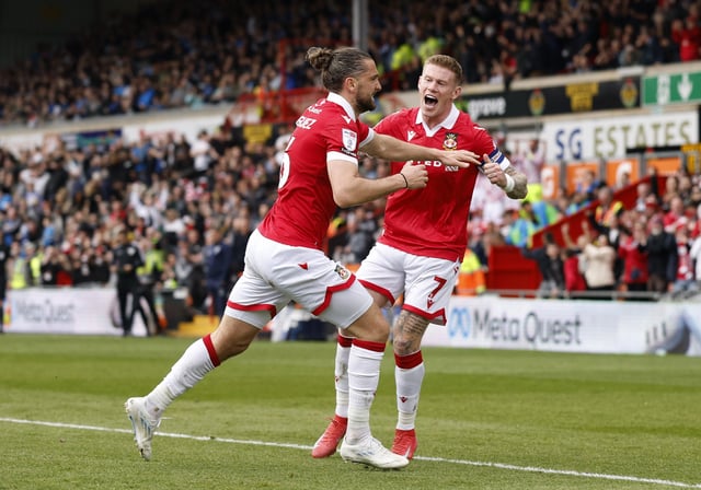 Soccer Football - League One - Wrexham v Stockport County - SToK Racecourse, Wrexham, Wales, Britain - March 22, 2025 Wrexham's Jay Rodriguez celebrates scoring their first goal with James McClean Action Images/Jason Cairnduff/File Photo