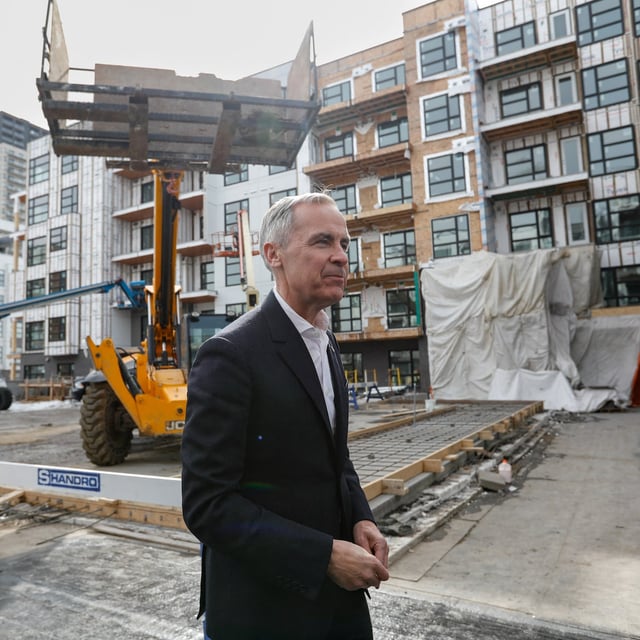 Canada’s Prime Minister Mark Carney walks out after making a housing announcement at a new development in Edmonton, Alberta, Canada March 20, 2025.  REUTERS/Amber Bracken