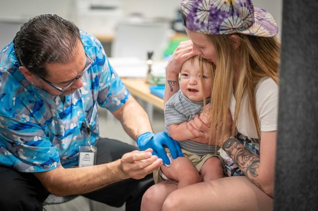One-year-old River Jacobs is held by his mother, Caitlin Fuller, while he receives an MMR vaccine from Raynard Covarrubio, at a vaccine clinic put on by Lubbock Public Health Department on March 1 in Lubbock, Texas. Bay Area health officials last week reported the region’s first confirmed measles case of the year. The case in San Mateo County, detected in February, was linked to an international traveler.
 