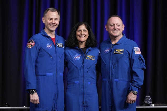 Astronauts Nick Hague, Suni Williams, and Butch Wilmore pose for a photo during a press conference at Johnson Space Center on Monday, March 31, 2025, in Houston. (AP Photo/Ashley Landis)