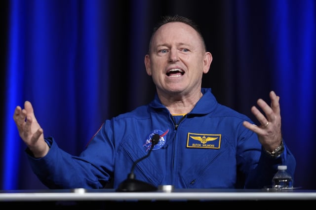 Astronaut Butch Wilmore talks to reporters during a press conference at Johnson Space Center on Monday, March 31, 2025, in Houston. (AP Photo/Ashley Landis)