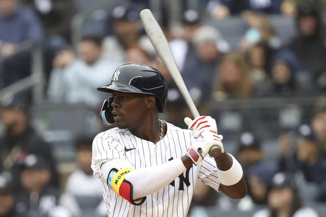 New York Yankees' Jazz Chisholm Jr. prepares to bat during the first inning of a baseball game against the Milwaukee Brewers, Sunday, March 30, 2025, in New York. 