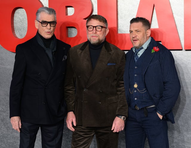 (L-R) Pierce Brosnan, Guy Ritchie and Tom Hardy attend the &#34;MobLand&#34; Global Premiere at the Odeon Luxe Leicester Square on March 27, 2025 in London, England.