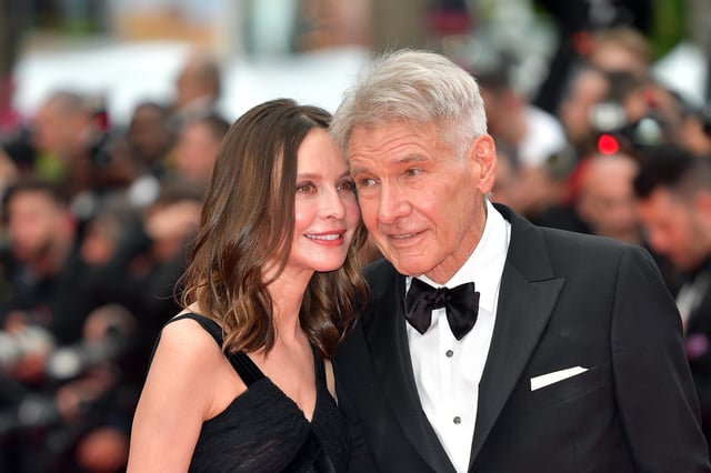 Calista Flockhart and Harrison Ford attend the &#34;Indiana Jones And The Dial Of Destiny&#34; red carpet during the 76th annual Cannes film festival at Palais des Festivals on May 18, 2023 in Cannes, France.