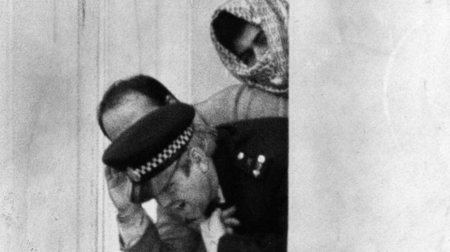 Lock and another hostage with one of the terrorists on the fifth day of the Iranian embassy siege