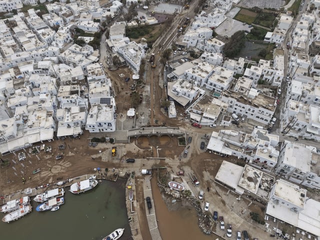 An aerial photograph taken by a drone shows the port of Naousa, after a powerful storm which has triggered widespread flooding on the Aegean Sea island of Paros, Greece, Tuesday, April 1, 2025. (AP Photo/Stathis Roussos)