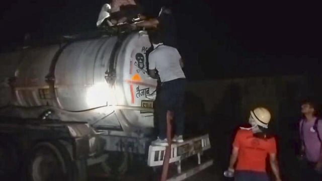 Rescuers check the nitrogen gas leak from a tanker parked inside an acid factory in Rajasthan's Beawar (PTI)