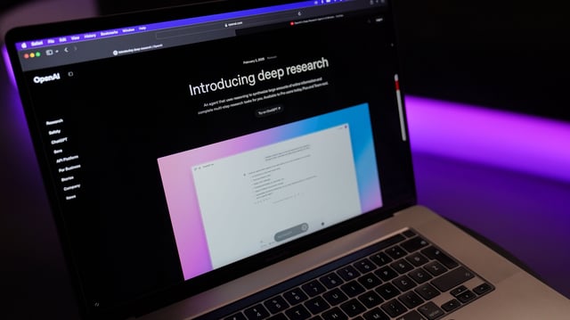 Deep Research running in ChatGPT on a laptop