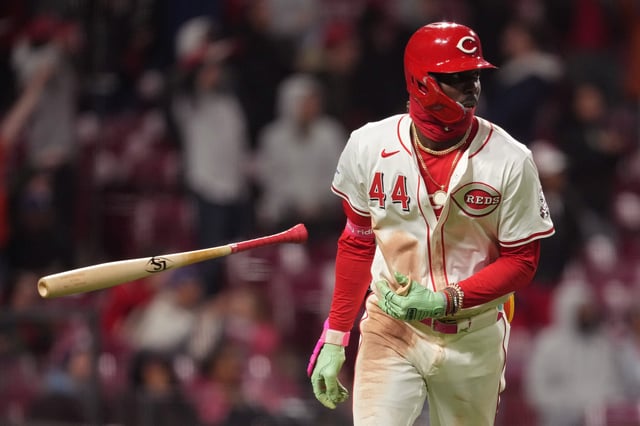 CINCINNATI, OHIO - MARCH 31: Elly De La Cruz #44 of the Cincinnati Reds flips his bat on a two-run home run in the seventh inning against the Texas Rangers at Great American Ball Park on March 31, 2025 in Cincinnati, Ohio.