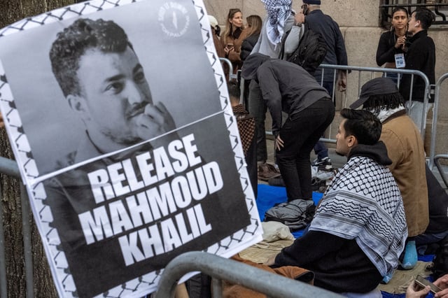 Muslim protestors pray outside the main campus of Columbia University during a demonstration to denounce the immigration arrest of Mahmoud Khalil, a pro-Palestinian activist who helped lead protests against Israel at the university, in New York City, U.S., March 14, 2025. REUTERS/David Dee Delgado/File Photo/File Photo