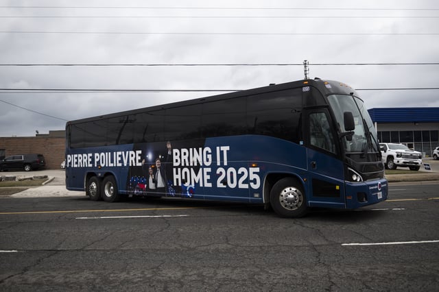The Federal Conservative campaign bus leaves a federal election campaign event at Barbara Caffe, in Stoney Creek, Ont., on Tuesday, March 25, 2025. 