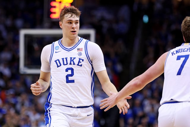 Mar 29, 2025; Newark, NJ, USA; Duke Blue Devils forward Cooper Flagg (2) celebrates with guard Kon Knueppel (7) during the second half against the Alabama Crimson Tide in the East Regional final of the 2025 NCAA tournament at Prudential Center. Mandatory Credit: Vincent Carchietta-Imagn Images/File Photo