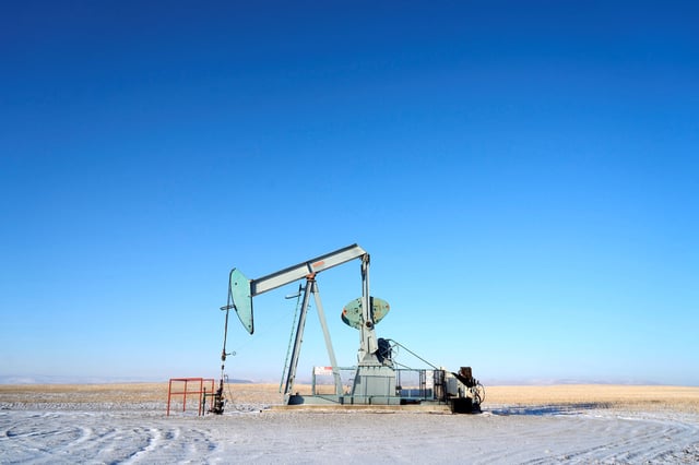 A view of an oil pump jack on the prairies near Claresholm, Alberta, Canada January 18, 2025.  REUTERS/Todd Korol/File Photo