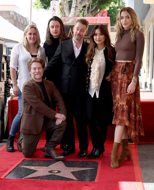 (From left) Quinn Culkin, Seth Green, Rory Culkin, Macaulay Culkin, Brenda Song and Paris Jackson attend a ceremony honoring Macaulay Culkin with a star on the Hollywood Walk of Fame.