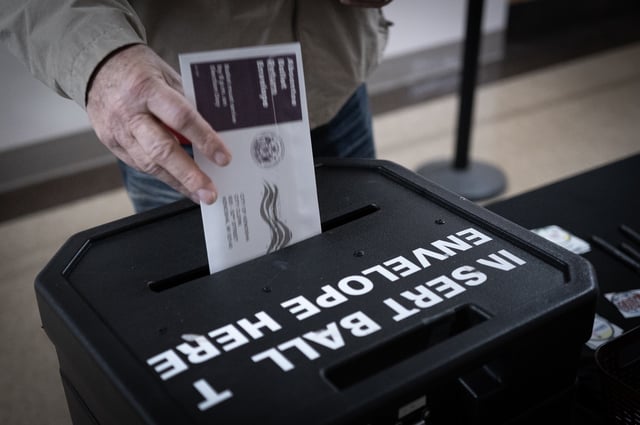 A Wisconsin resident participates in early voting in Kenosha, Wisconsin on March 26, 2025.