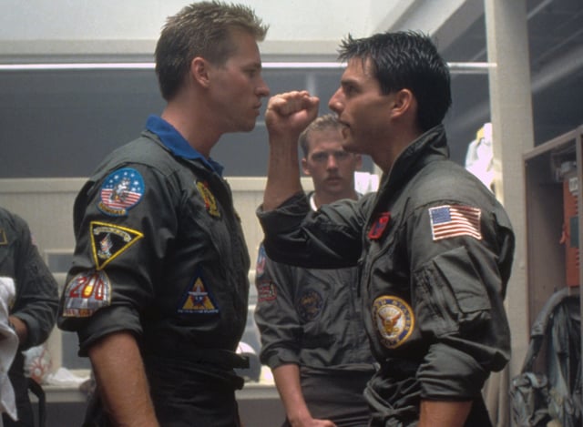American actors Val Kilmer and Tom Cruise on the set of Top Gun, directed by Tony Scott.