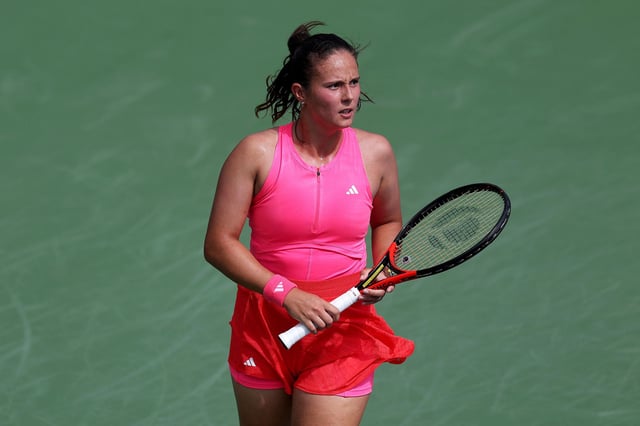 DUBAI, UNITED ARAB EMIRATES - FEBRUARY 17: Daria Kasatkina looks on while playing against Sorana Cirstea of Romania in their first round match during day two of the Dubai Duty Free Tennis Championships, part of the Hologic WTA Tour at Dubai Duty Free Tennis Stadium on February 17, 2025 in Dubai, United Arab Emirates. (Photo by Christopher Pike/Getty Images)