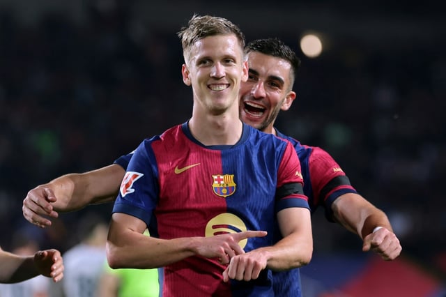 Barcelona midfielder Dani Olmo (front) has been playing under a temporary measure granted by Spain's sports council